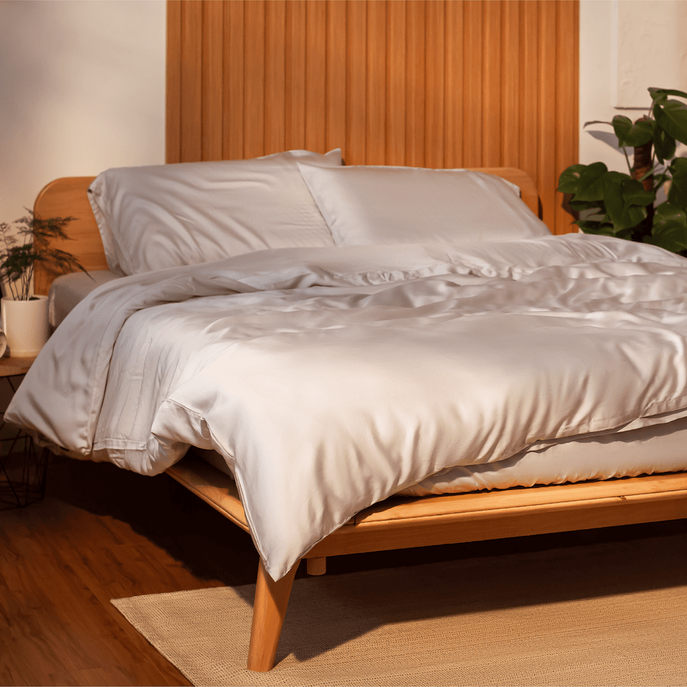 Sonno duvet insert on a neatly made bed, designed with high-quality, breathable, and moisture-wicking materials for a comfortable night's sleep.